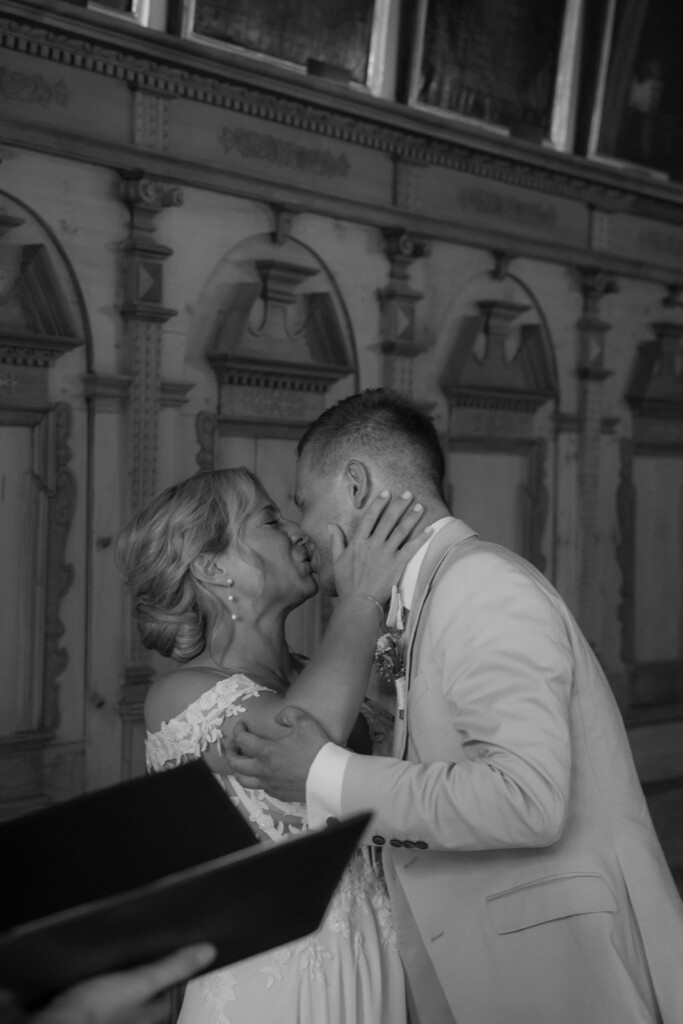 couple kissing each other after saying yes at their civil wedding