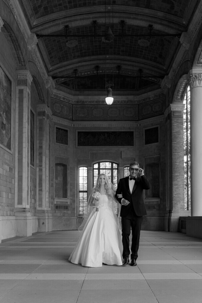 bride walking down the aisle with her dad at the trinkhalle in baden-baden