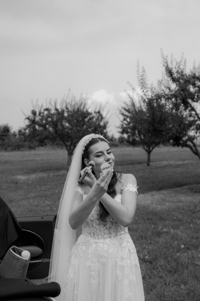 bride checking her make up