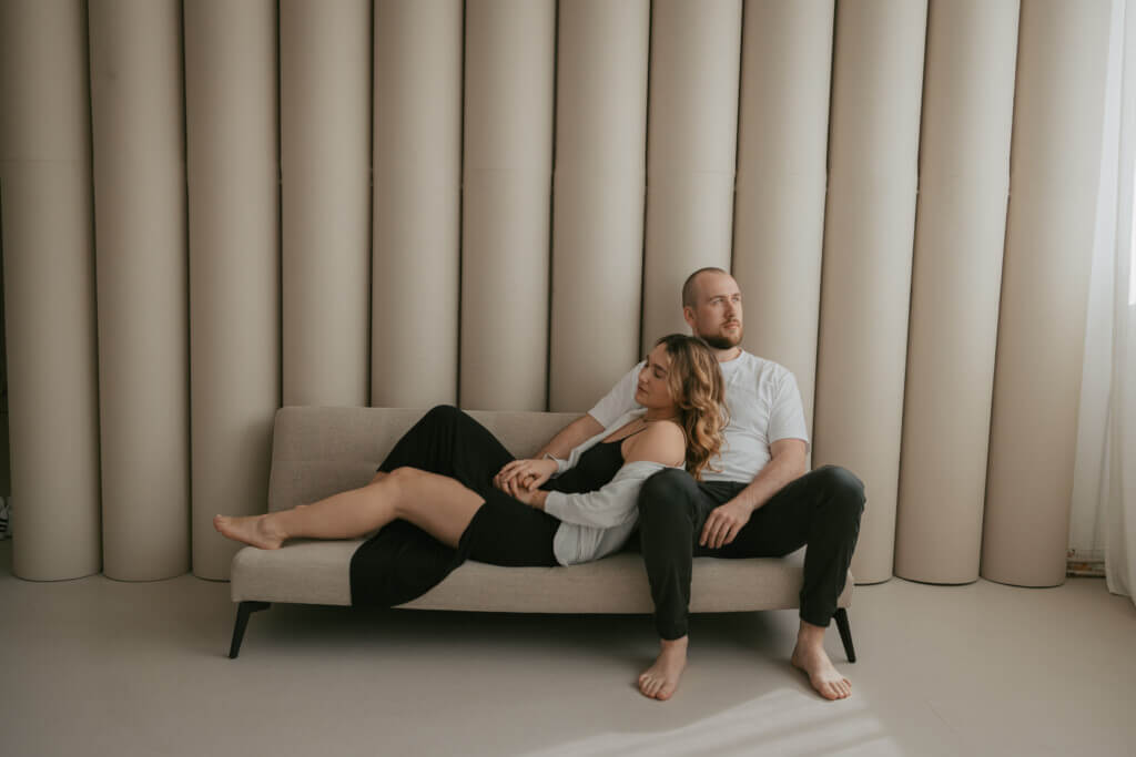 couple sitting together on a couch